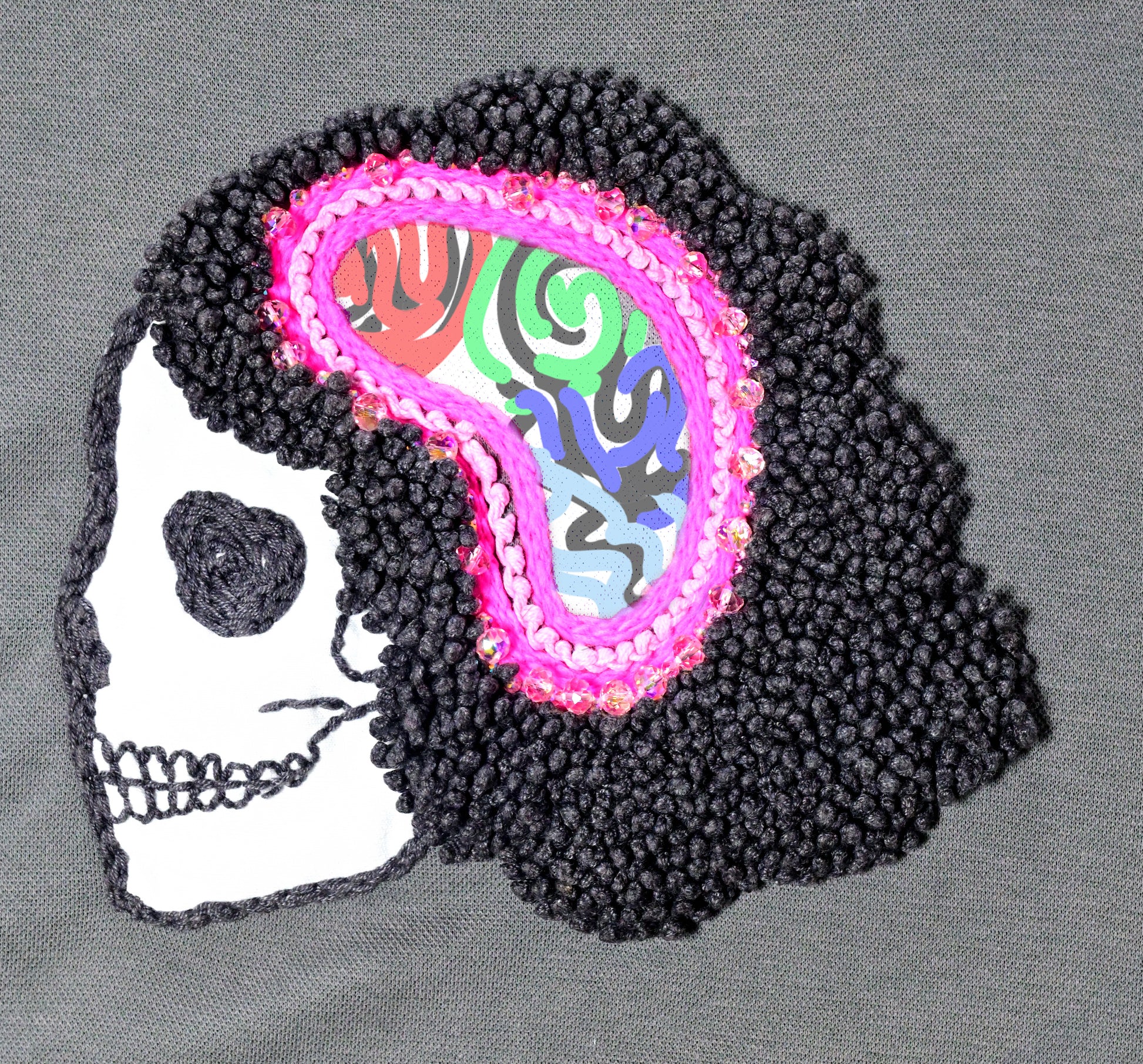 Colorful skull design with brain illustration on a gray background